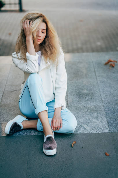 istock beautiful young girl posing at the camera 905819808