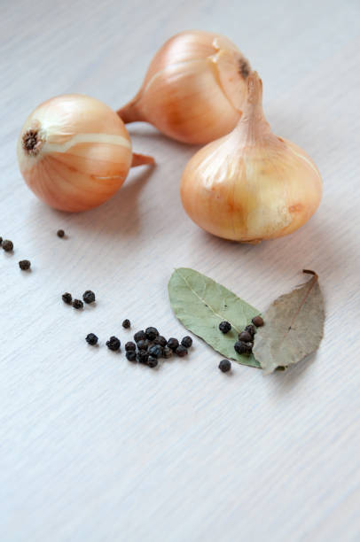istock On the table, seasonings: onion, black pepper peas, bay leaf 905822920
