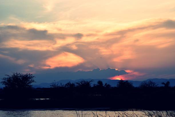 istock Beautiful blue sky and dark cloud at sunset 905823652