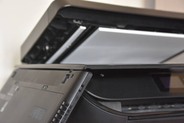 istock Technological improvisation Concept , Photo of a Laptop on a copier 905824520