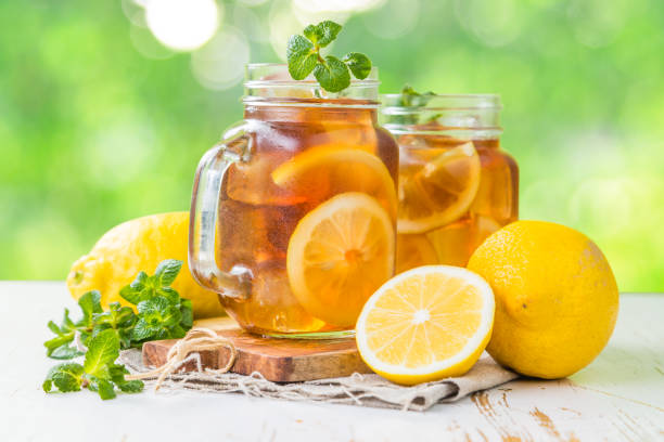 istock Iced tea in glass jars 905826774