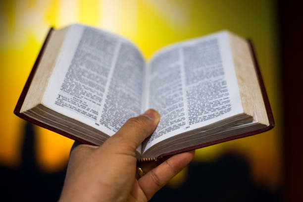 istock A man reading the Holy Bible. 905828258