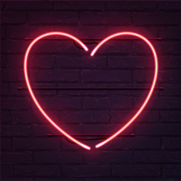 istock Heart pink neon sign. Vector realistic neon heart on brick wall. 905831702
