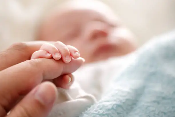 Photo of Photo of newborn baby fingers