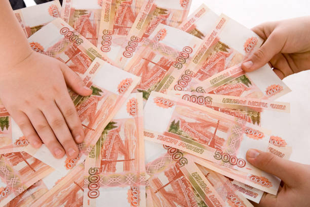 istock The hands holding  Russian banknotes 905839606