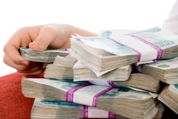 istock The hands holding  Russian banknotes 905839610