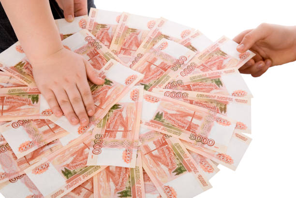 istock The hands holding  Russian banknotes 905839640