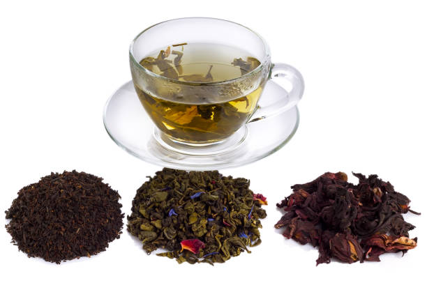 istock different tea in the background with a transparent cup of brewed tea 905840490