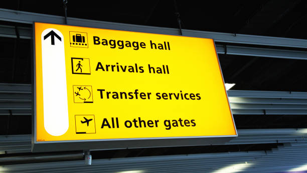 istock Airport terminal arrival departure sign timetable flight information 905845578