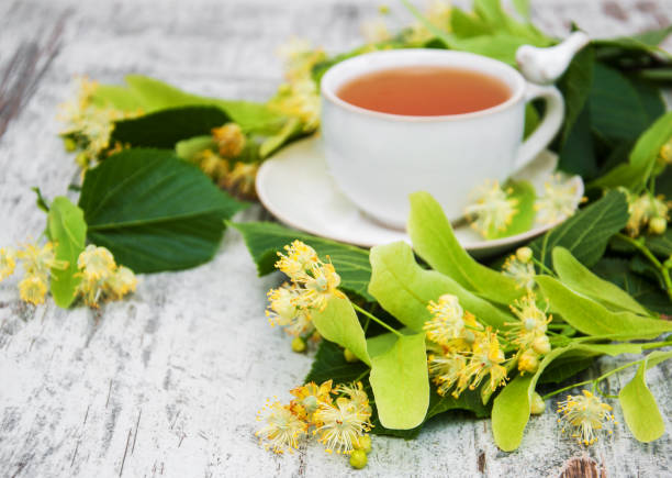 istock cup of herbal tea with linden flowers 905845832