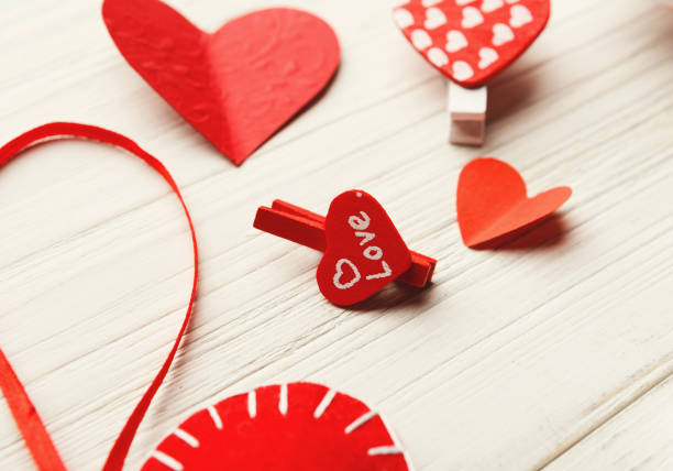 istock Valentine day background, handmade hearts on wood with copy space 905848400