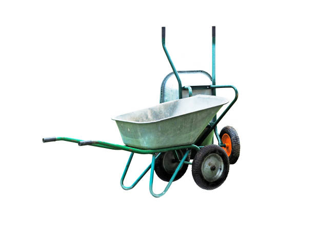 istock Two wheelbarrows isolated on white background. Gardening tools. Old barrows with two wheels for transportation cargo. Agriculture and building work inventories. Top view and from the side 905848776