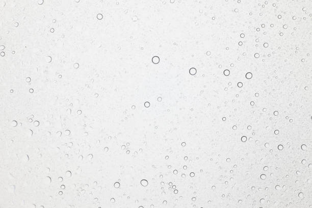 istock Water drops on glass, Rain droplets on glass background. 905853690
