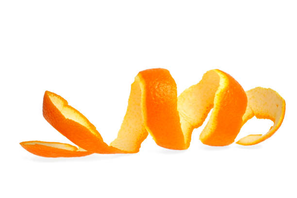 istock Orange peel against white background 905854102