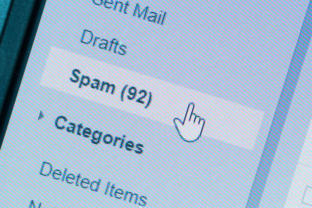 Spam message in folder Macro image of spam mailbox on LCD monitor e mail spam stock pictures, royalty-free photos & images