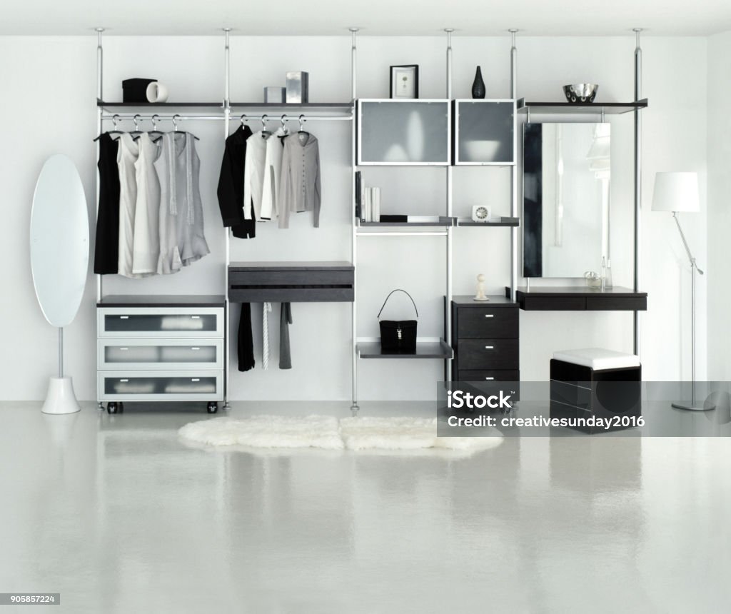 Dressing room Dressing room with open wardrobe in white color tone. Walk-in Closet Stock Photo