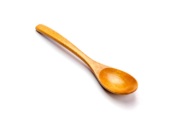 istock Wooden spoon on white background 905857578