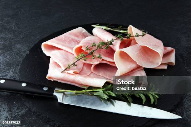 Sliced Ham On Stone Background Fresh Prosciutto Pork Ham Sliced Stock Photo - Download Image Now