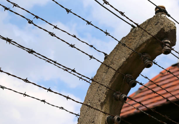 border of an ancient prison of second world war with barbed wire