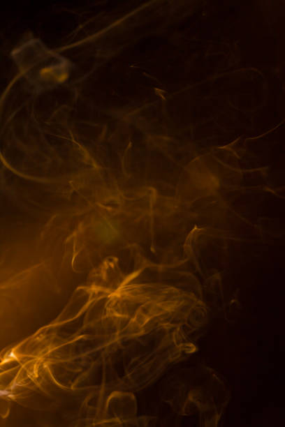 Gold smoke on black background. Gold smoke on black background. 8564 stock pictures, royalty-free photos & images