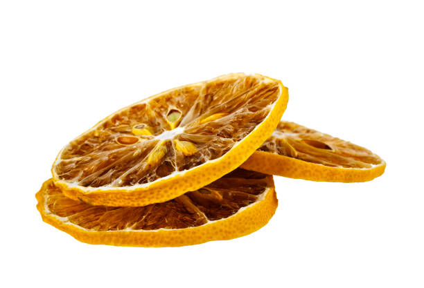 istock Dried lemon slices isolated on white background 905859756