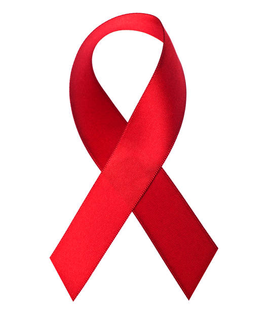 istock Aids awareness red ribbon isolated on white background 905860474