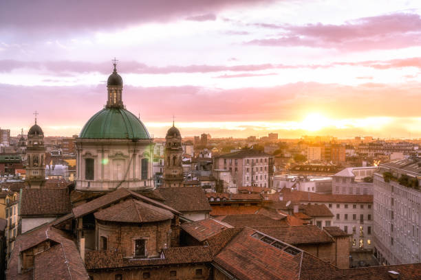 Milan skyline with church cupolas, Italy beautiful Milan city skyline with Sant'Alessandro in Zebedia when sunset milan photos stock pictures, royalty-free photos & images