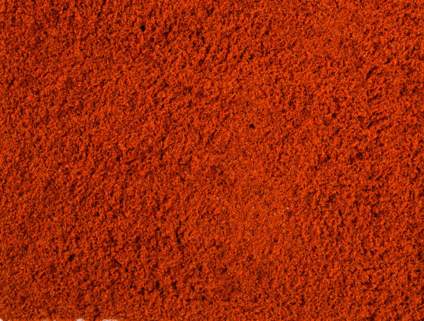 istock Texture background. Red paprika powder Top view 905866704