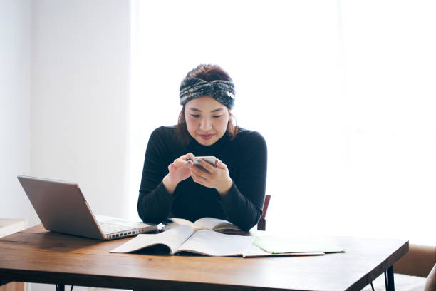 istock Woman working at home 905869630