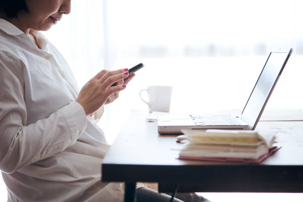 istock Woman working at home 905869696