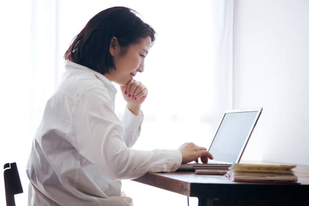 istock Woman working at home 905869702