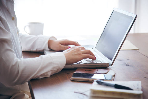 istock Woman working at home 905869716