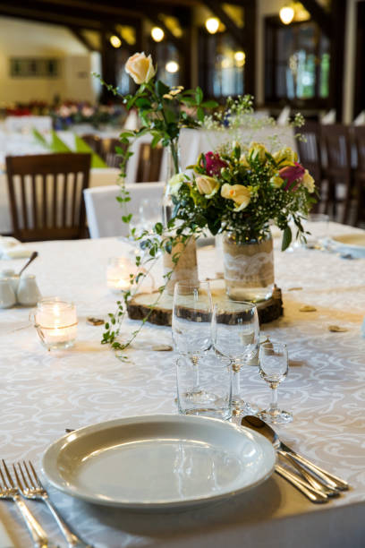 istock A beautifully decorated and covered table prepared for guests 905870358