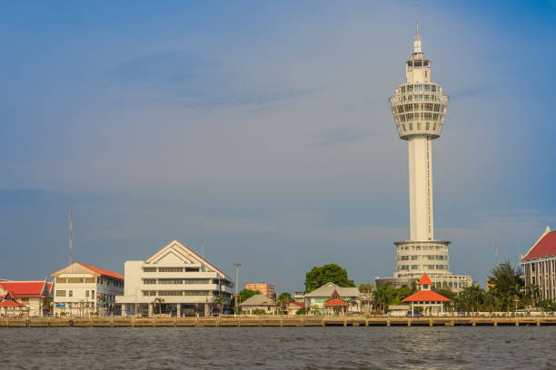 istock Riverfront view of Samut Prakan city hall with new observation tower and boat pier. Samut Prakan is at the mouth of the Chao Phraya River on Gulf of Thailand. 905871564
