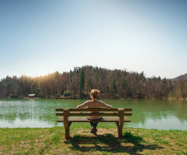 istock Woman On The Bench 905871780