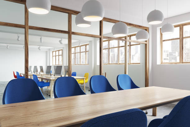 istock Wooden table, blue chairs meeting room side 905874306