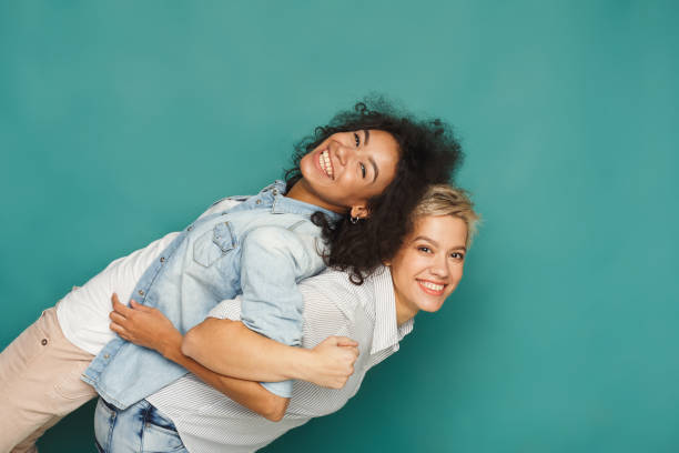 istock Emotional friends having fun at blue background 905879482
