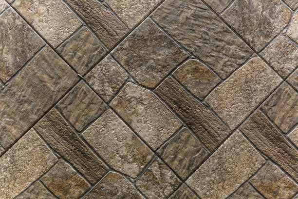 istock Stone wall brick texture background beige surface facade for design and decoration. 905879750