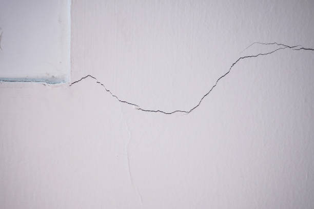 istock cracked on wall background close up 905882222