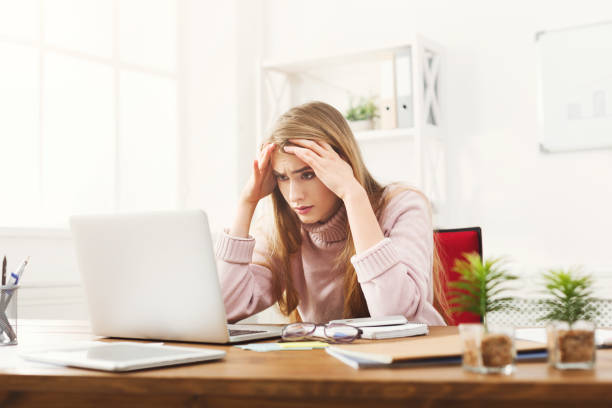 istock Tired business woman at office copy space 905883924