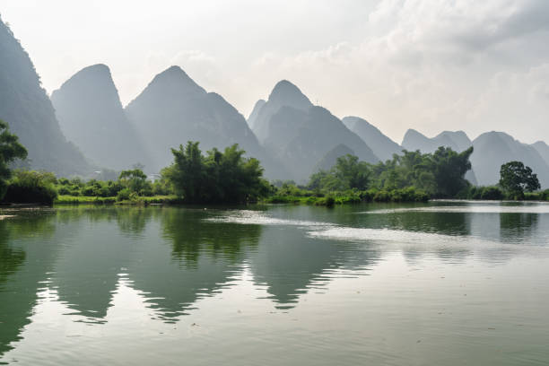 istock Amazing view of karst mountains reflected in water, Yangshuo 905884310