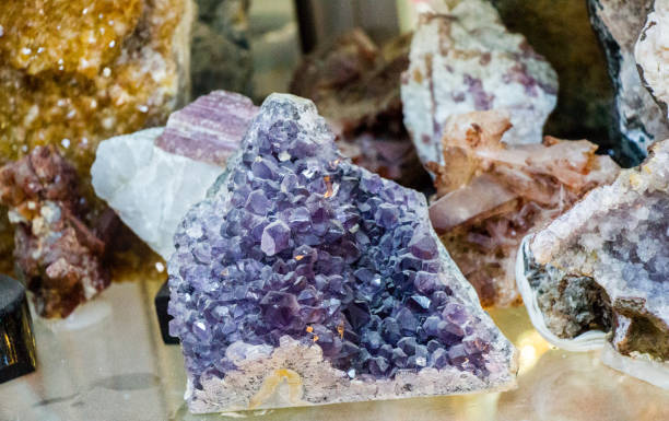 istock Raw violet amethyst rock with crystal ametist 905884638