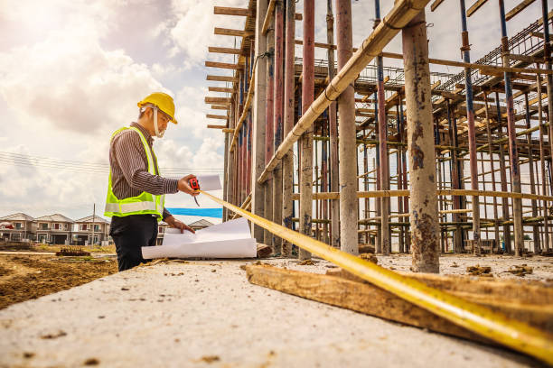 istock Asian business man construction engineer worker at house building site 905889842