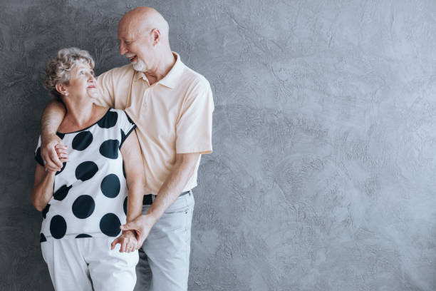 istock Lovely senior couple hugging 905890412