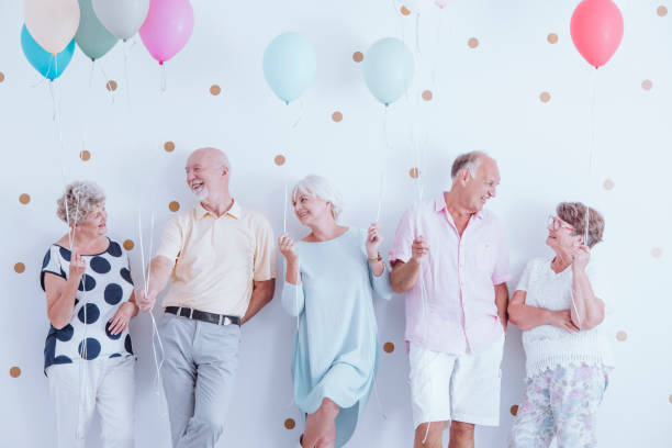 istock Retired friends at graduation anniversary 905890420