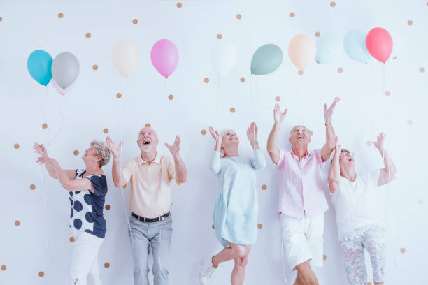 istock Excited elderly men and women 905890424