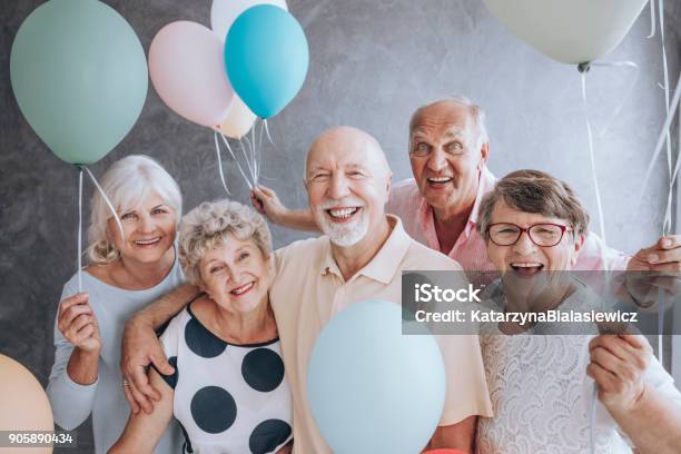 Closeup Of Excited Pensioners Stock Photo - Download Image Now - Senior Adult, Party - Social Event, Celebration