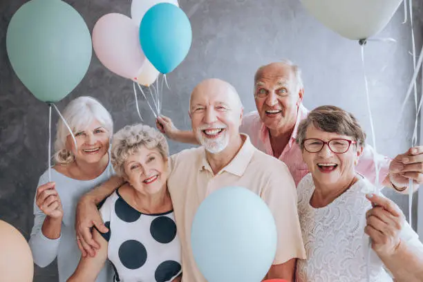 Photo of Close-up of excited pensioners