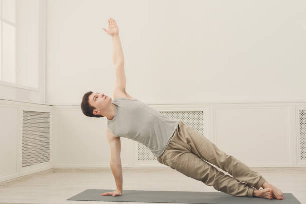 istock Fitness man plank training indoors 905897492
