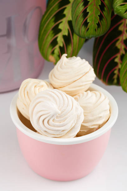 istock Homemade white zephyr or marshmallow in pink bowl 905898162